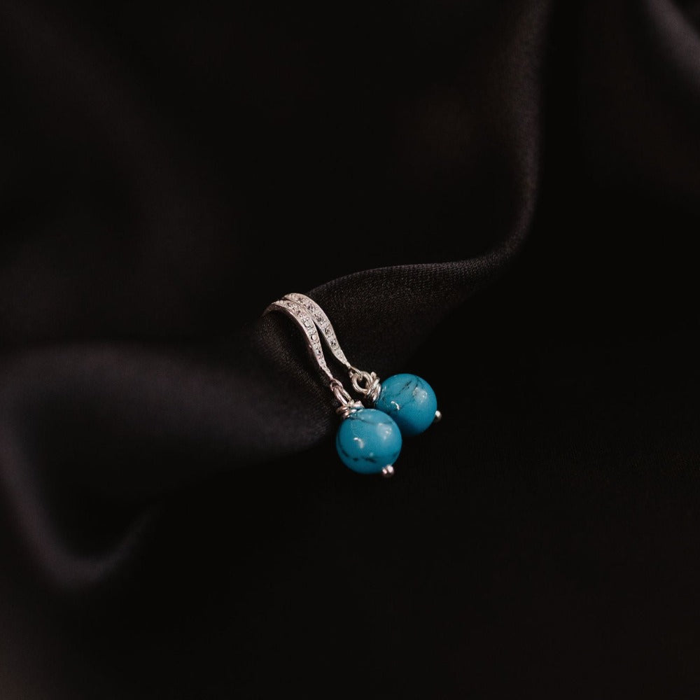  blue howlite earrings health amulet