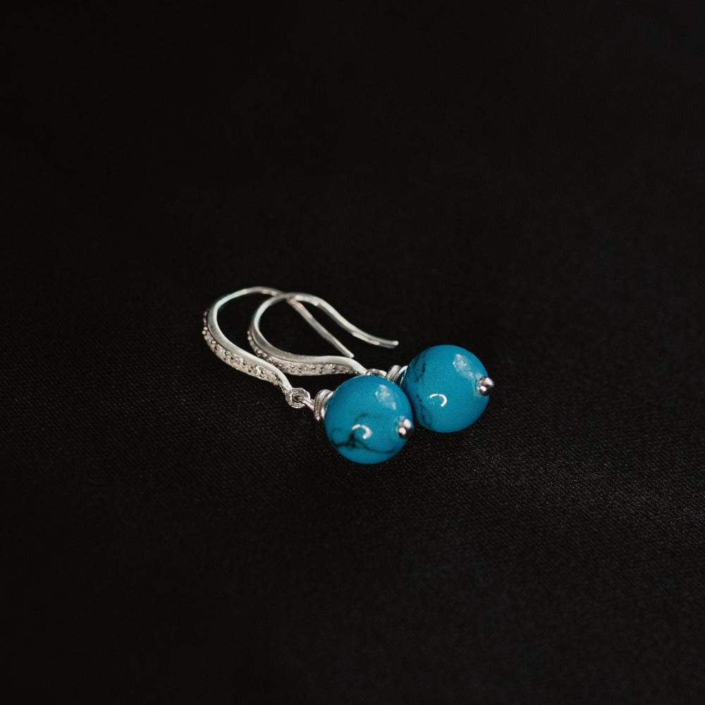   blue howlite earrings health amulet