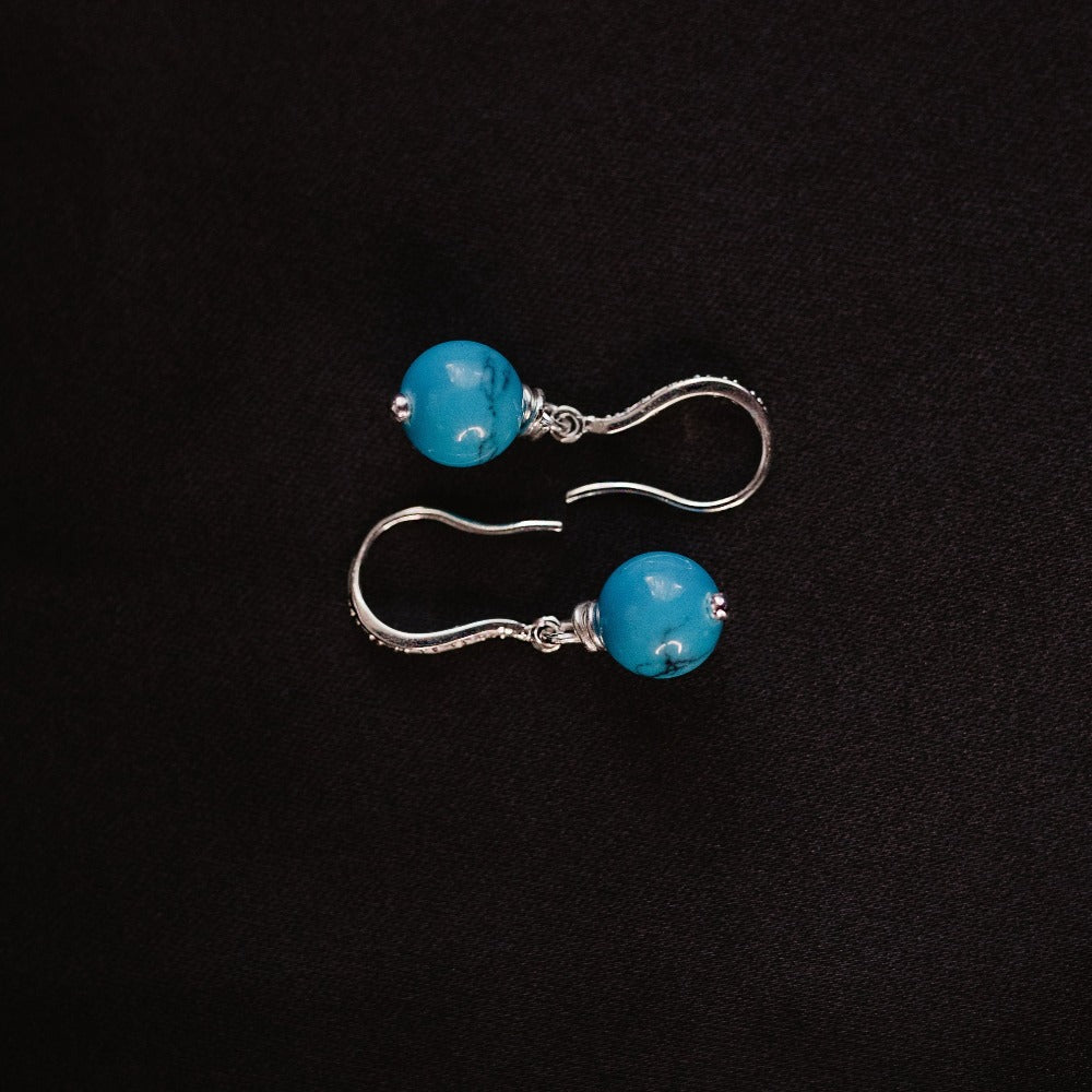   blue howlite earrings health amulet